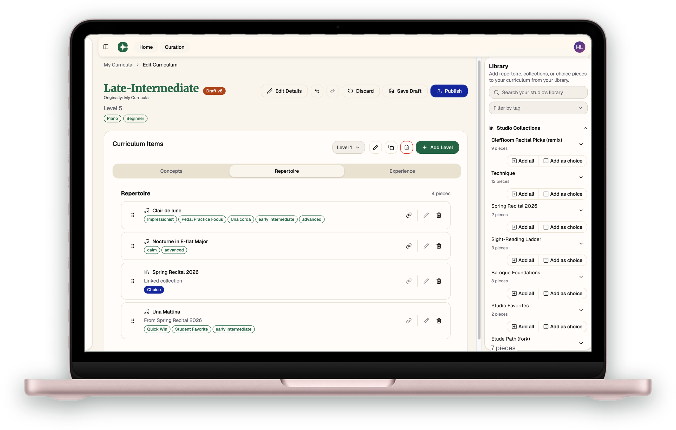 The curriculum builder on a laptop, with levels, concepts and repertoire assembled into one plan.